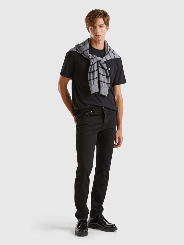 Jeans slim fit cinco bolsos Homem