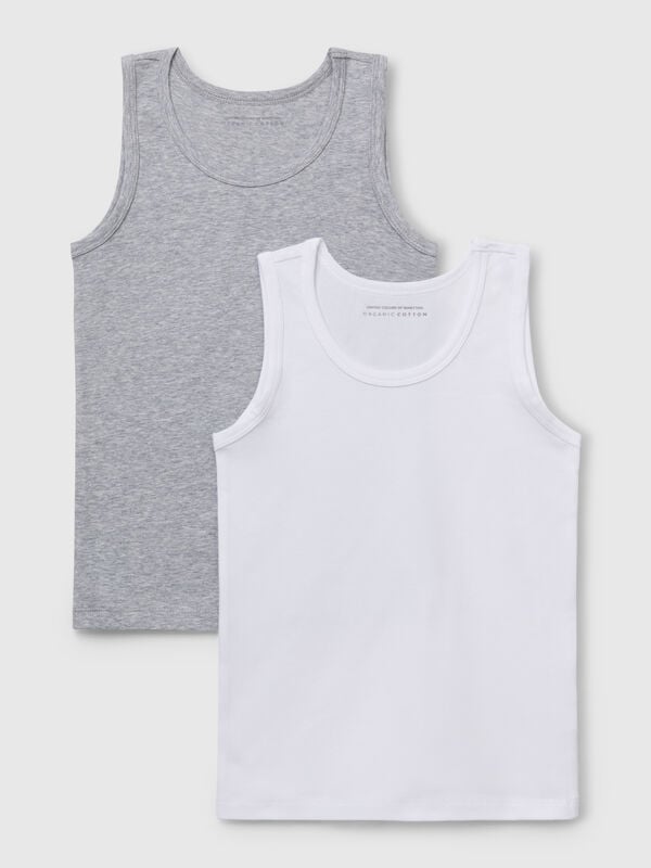Duas t-shirts sem mangas em algodão orgânico stretch Menino