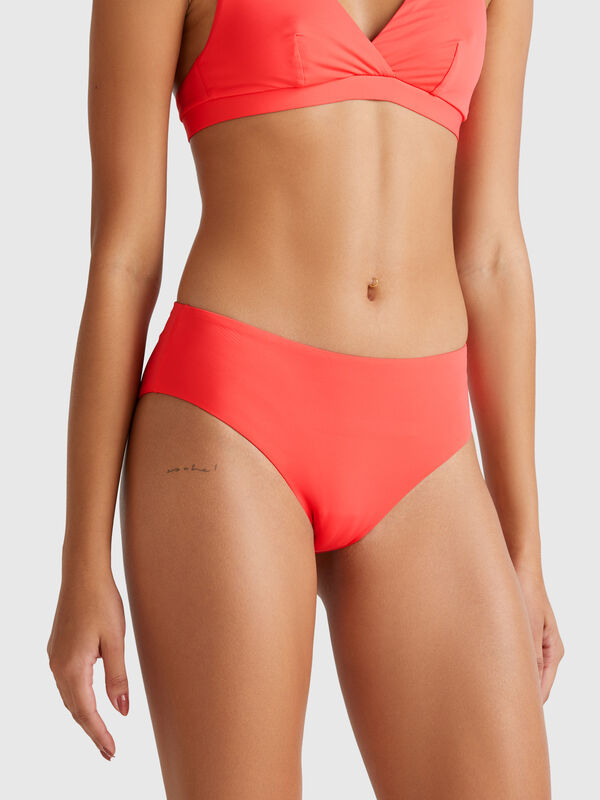 Slip de banho de lateral alta em ECONYL® Mulher