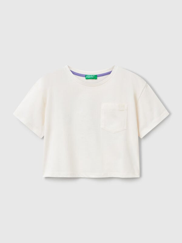 T-shirt boxy fit com estampa atrás Menina