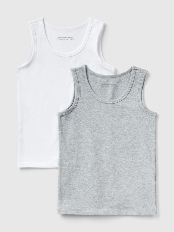 Duas t-shirts sem mangas em algodão orgânico stretch Menino