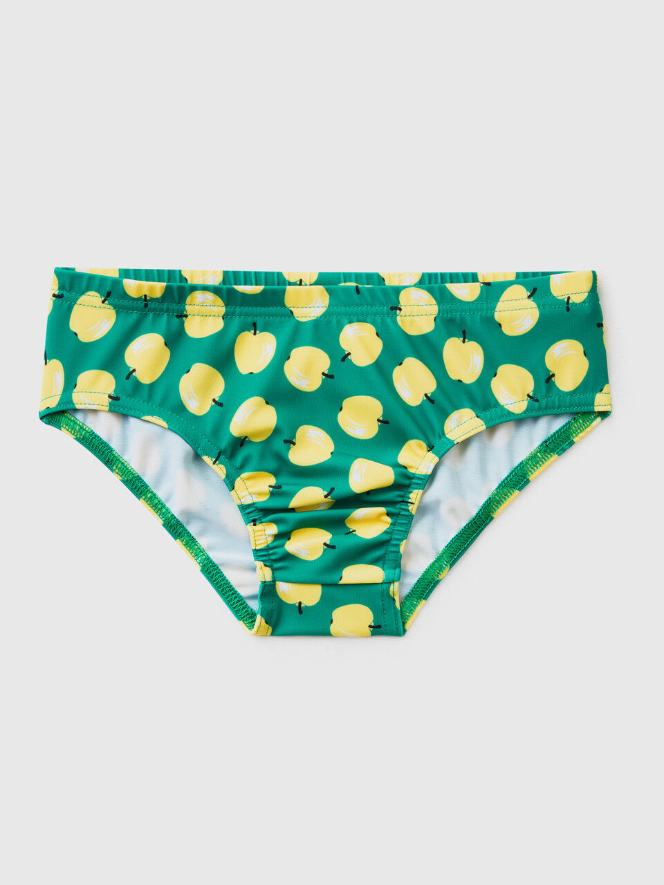 Slip de banho verde com padrão maçãs