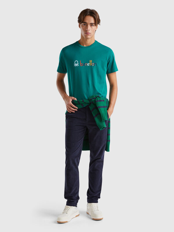 Calças slim fit em veludo stretch Homem