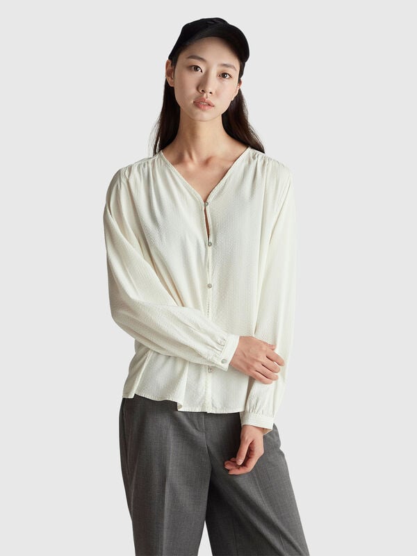 Camisa às riscas com decote em V Mulher