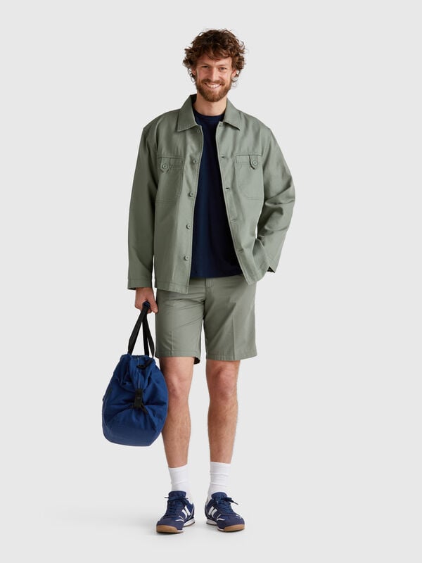 Bermudas chino em lona Homem