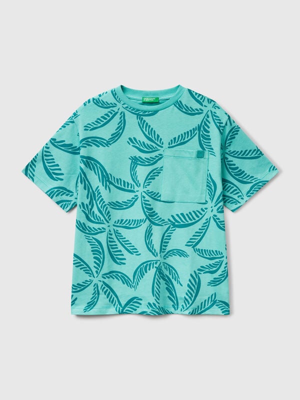 T-shirt verde com estampado tropical Menino