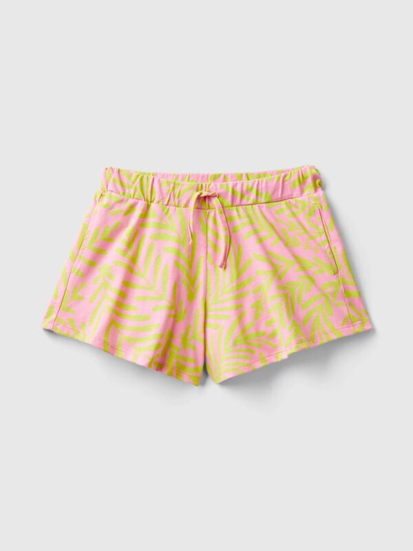 Shorts rosa claro com estampa tropical Menina
