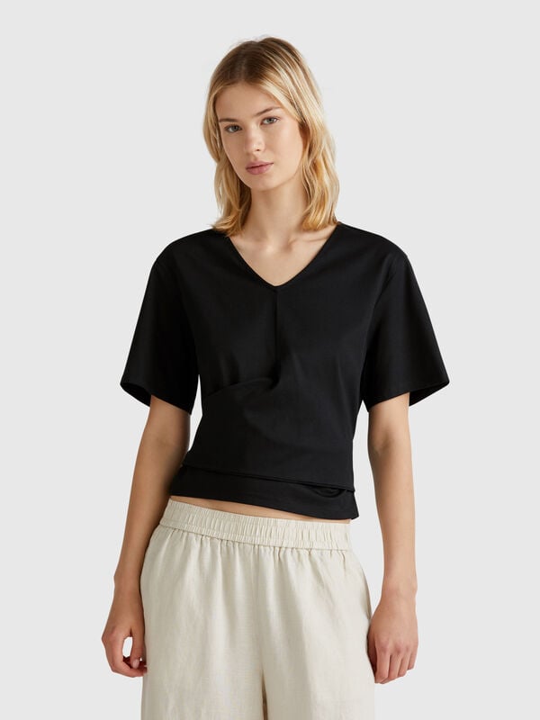 T-shirt com nó atrás Mulher