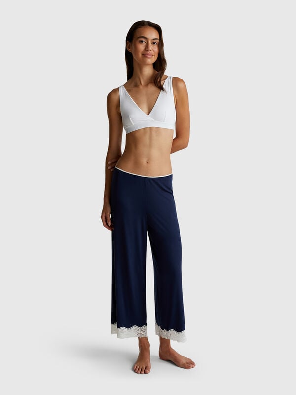 Calças fluidas 3/4 com renda Mulher