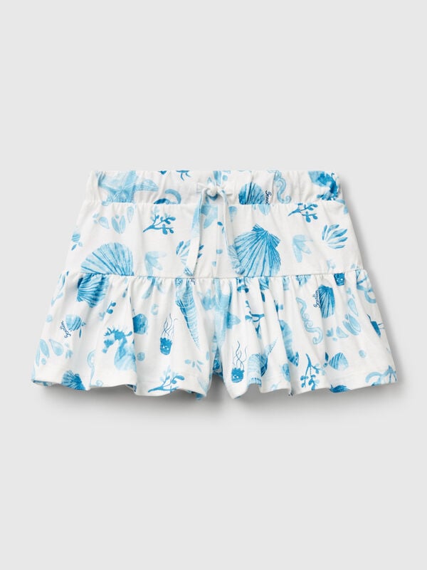 Shorts brancos com conchas azul Menina
