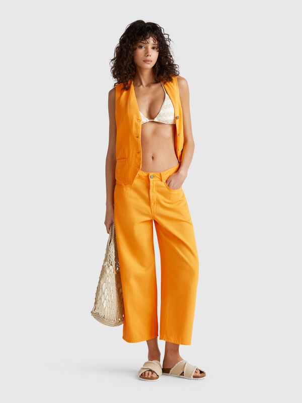 Calças amarelas cinco bolsos Mulher