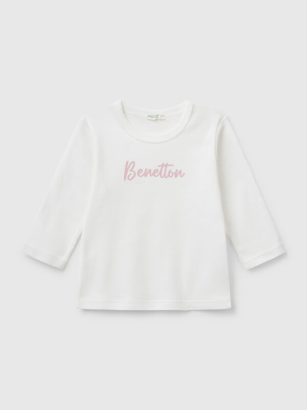 T-shirt de manga comprida em algodão canelado. Recém-nascido