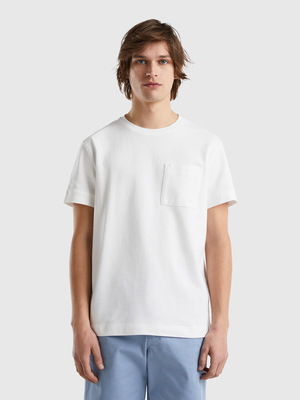 T-shirt com bolso pequeno 100% algodão