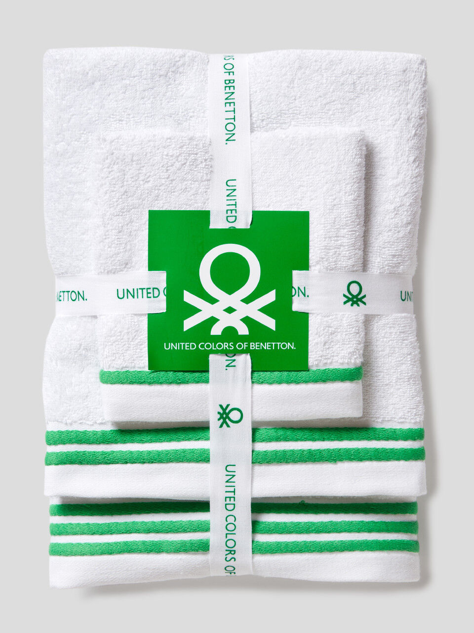 Três toalhas com logótipo