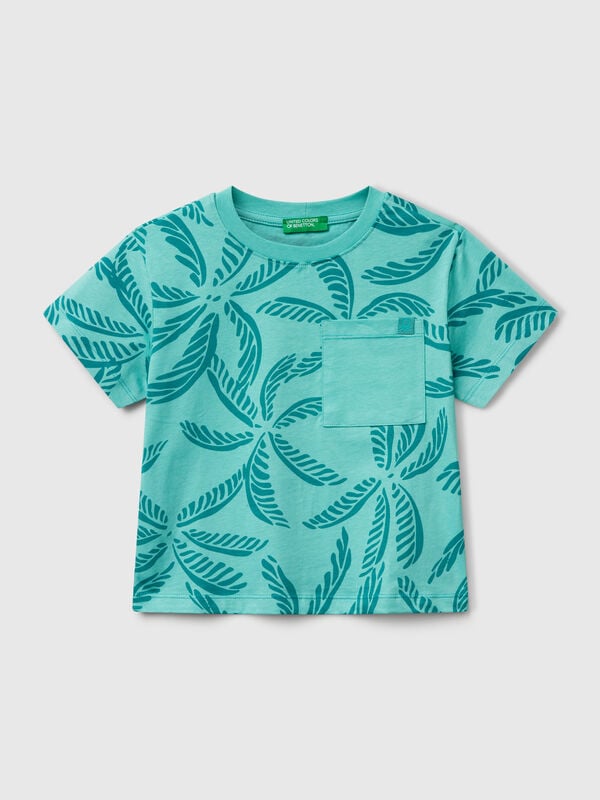 T-shirt verde com estampado tropical Menino