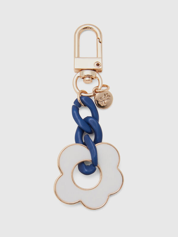 Porta-chaves dourado e azul com pendente flor Mulher