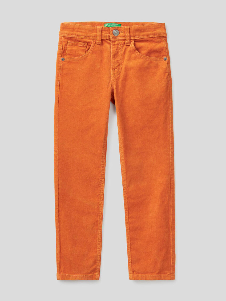 Calças slim fit em veludo stretch image number 1