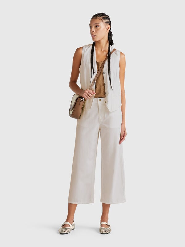 Calças brancas cinco bolsos Mulher