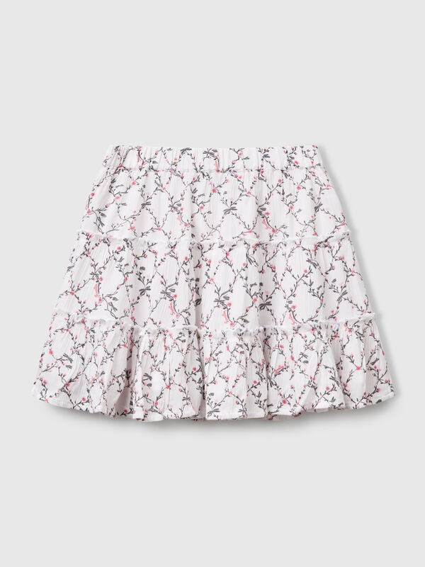 Minissaia às flores com folhos Menina
