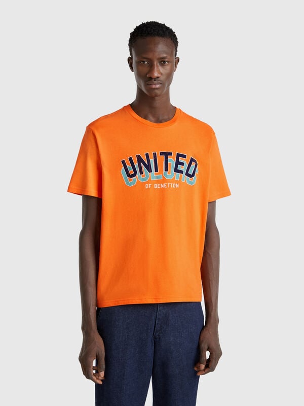 Camiseta laranja de algodão com logótipo azul escuro Homem