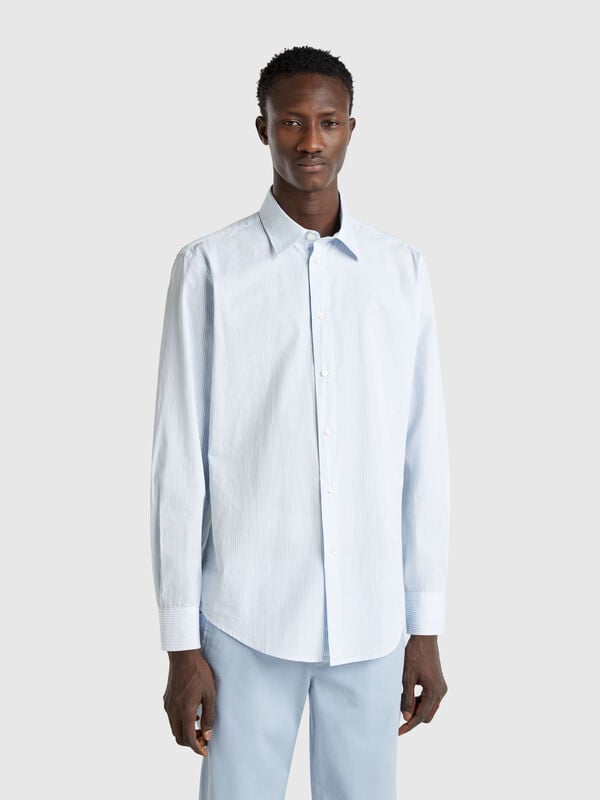 Camisa às riscas em algodão Homem
