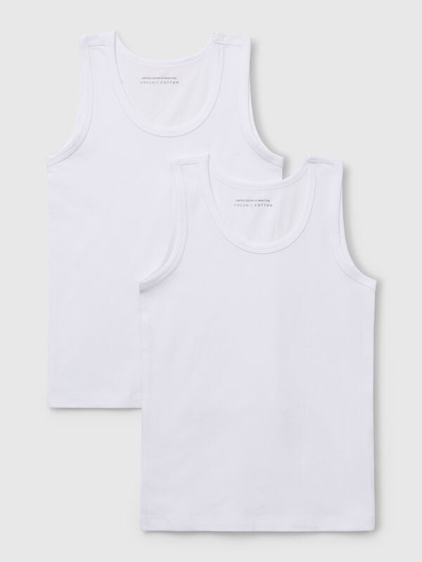 Duas t-shirts sem mangas em algodão orgânico stretch Menino
