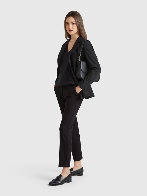 Calças fluidas slim fit Mulher