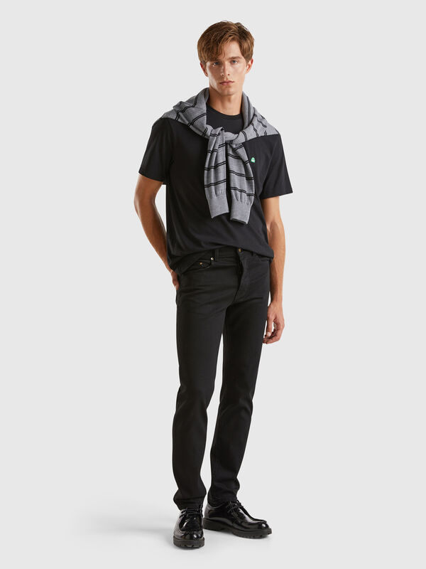 Jeans slim fit cinco bolsos Homem