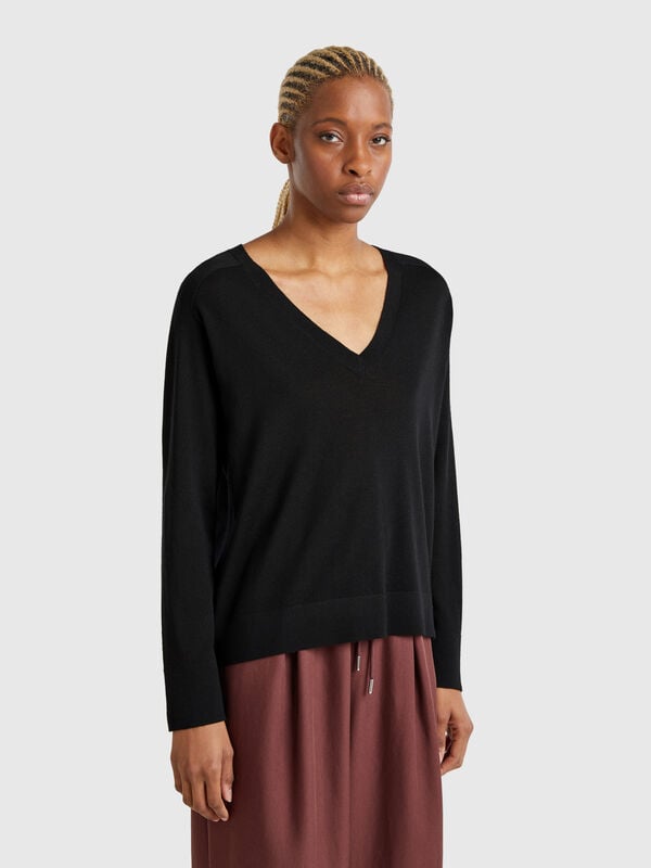Camisola com decote em V em pura lã Merino Mulher