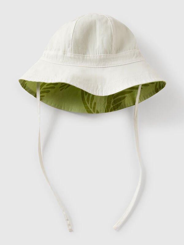 Chapéu reversível com estampado tropical Recém-nascido