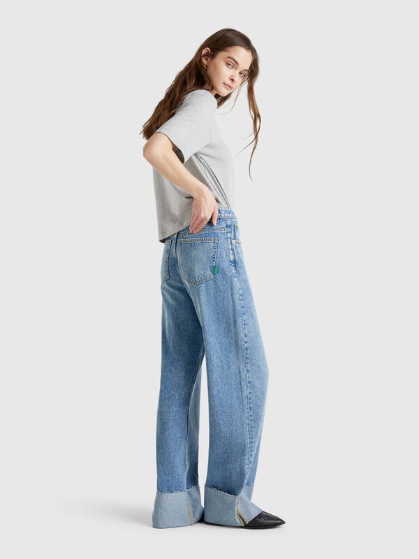 Jeans wide fit com dobra Mulher