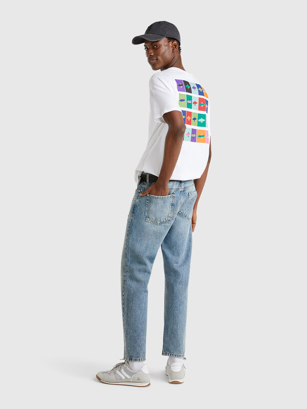 Jeans regular fit com rasgos Homem
