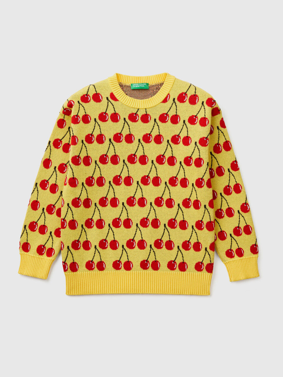 Camisola amarela com padrão de cerejas